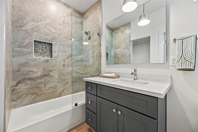1044 Homer St, Houston, TX 77091 - full bath with shower / tub combination, vanity, and wood finished floors