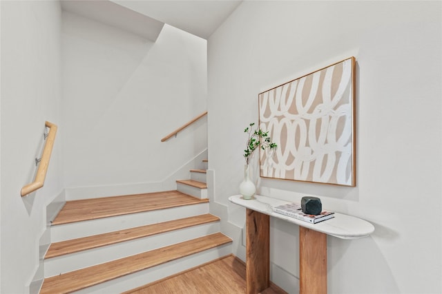 1044 Homer St, Houston, TX 77091 - stairway featuring wood finished floors