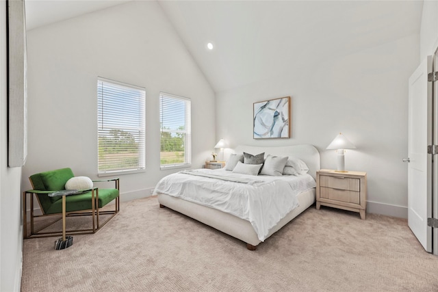 1044 Homer St, Houston, TX 77091 - bedroom featuring light colored carpet, baseboards, high vaulted ceiling, and recessed lighting