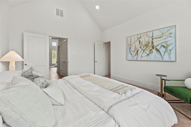 1044 Homer St, Houston, TX 77091 - bedroom with high vaulted ceiling, baseboards, and recessed lighting