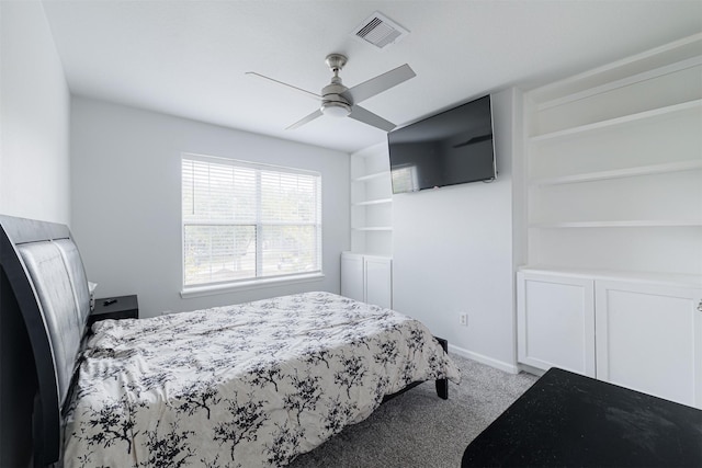 carpeted bedroom featuring visible vents and ceiling fan