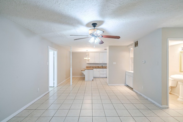 5023 Glendower Dr, Spring, TX 77373 - unfurnished living room with visible vents, a ceiling fan, baseboards, and light tile patterned floors