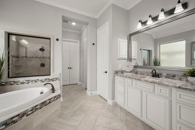 full bath featuring a garden tub, crown molding, vanity, a tile shower, and baseboards