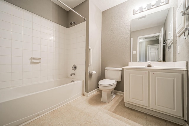10314 Friars Hl, Houston, TX 77070 - full bathroom featuring vanity, a textured wall, toilet, visible vents, and bathing tub / shower combination