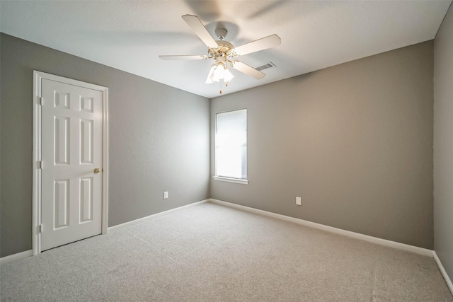 10314 Friars Hl, Houston, TX 77070 - carpeted spare room featuring visible vents, baseboards, and ceiling fan
