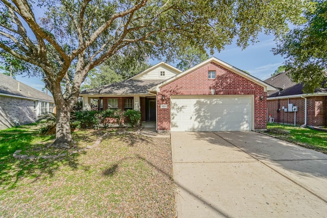 10314 Friars Hl, Houston, TX 77070 - view of front of house featuring brick siding, driveway, and a garage