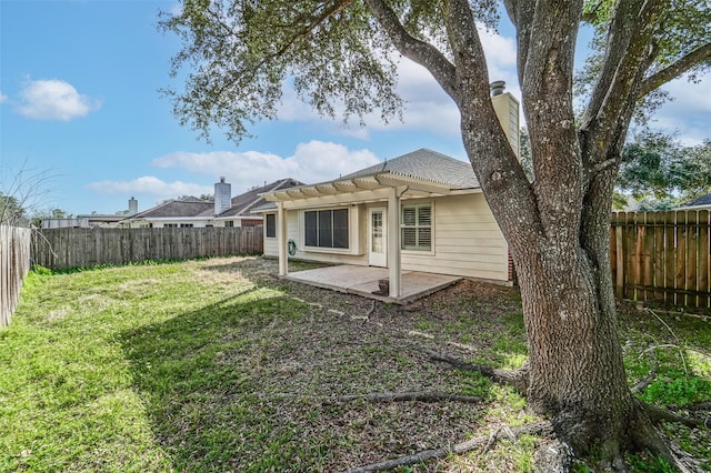 10314 Friars Hl, Houston, TX 77070 - rear view of property with a pergola, a patio area, a lawn, and a fenced backyard