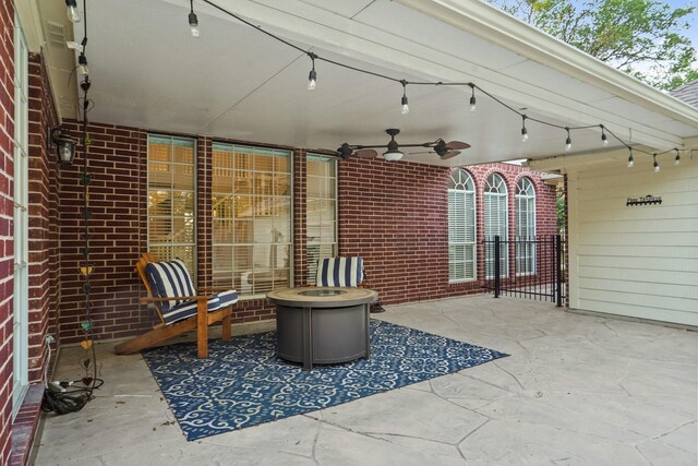 view of patio featuring a ceiling fan