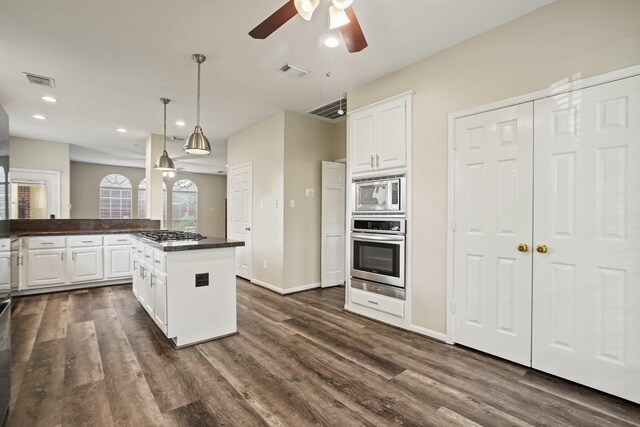 kitchen featuring a ceiling fan, visible vents, and appliances with stainless steel finishes