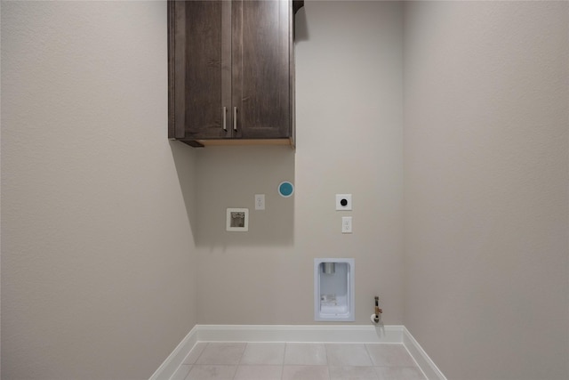 809 Coronado Terrace Ln, Katy, TX 77493 - washroom featuring hookup for an electric dryer, cabinet space, hookup for a gas dryer, washer hookup, and baseboards