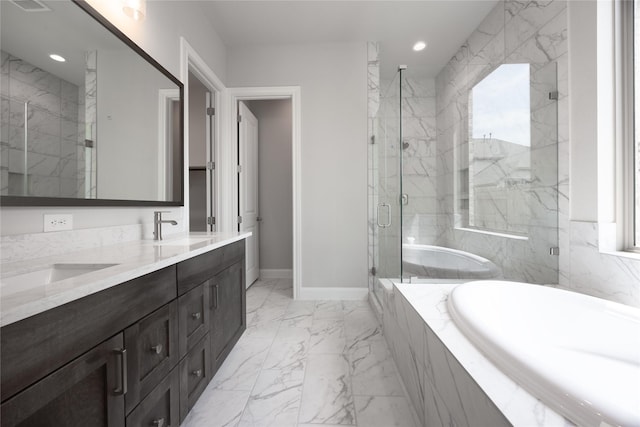 809 Coronado Terrace Ln, Katy, TX 77493 - bathroom with marble finish flooring, double vanity, a garden tub, a marble finish shower, and recessed lighting