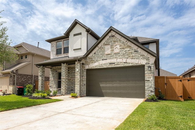 809 Coronado Terrace Ln, Katy, TX 77493 - view of front of property with stone siding, driveway, stucco siding, and a garage