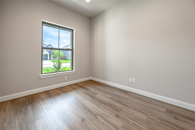 809 Coronado Terrace Ln, Katy, TX 77493 - empty room with baseboards and wood finished floors
