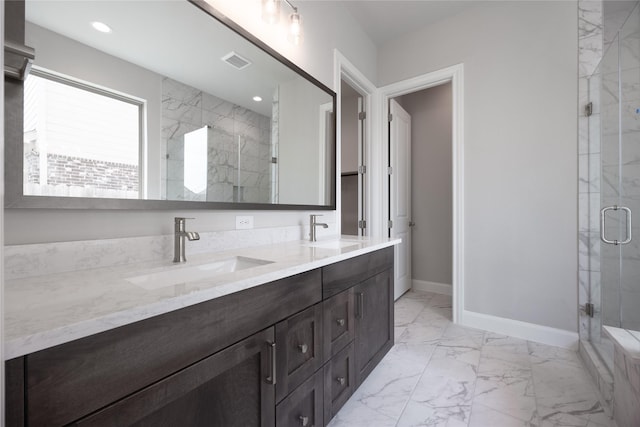 809 Coronado Terrace Ln, Katy, TX 77493 - bathroom featuring marble look tiles, double vanity, a marble finish shower, baseboards, and recessed lighting