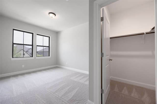 809 Coronado Terrace Ln, Katy, TX 77493 - unfurnished bedroom featuring carpet and baseboards