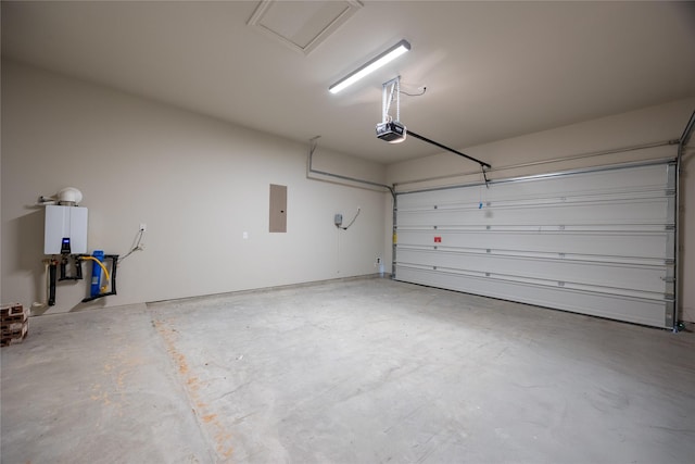 809 Coronado Terrace Ln, Katy, TX 77493 - garage featuring a garage door opener, electric panel, and water heater