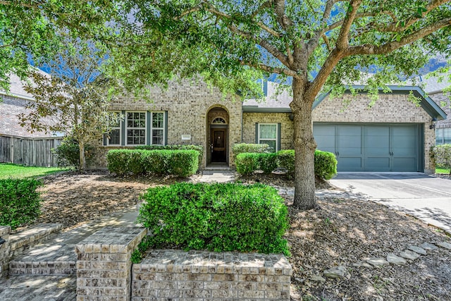 12510 Cove Landing Dr, Cypress, TX 77433 - view of front of house featuring concrete driveway, brick siding, and a garage