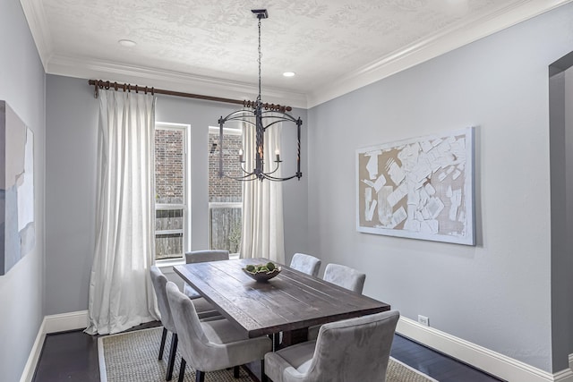 dining room featuring recessed lighting, dark wood-style floors, ornamental molding, baseboards, and a notable chandelier