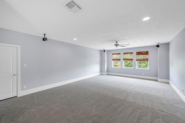 carpeted spare room featuring baseboards, visible vents, recessed lighting, and ceiling fan