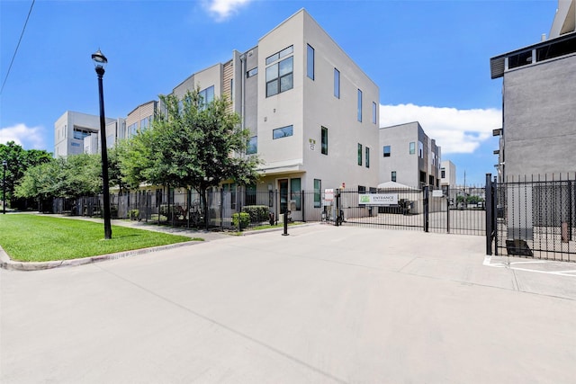 view of building exterior featuring fence