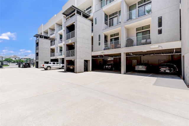 view of property with a parking lot