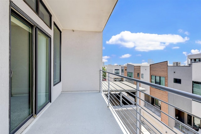 balcony featuring a residential view