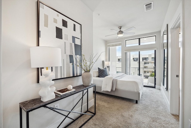 bedroom featuring visible vents, carpet, and ceiling fan