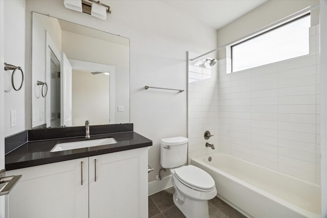 bathroom with shower / bath combination, toilet, vanity, and tile patterned floors