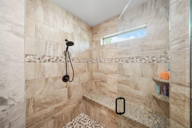 bathroom featuring a stall shower