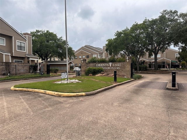 view of road featuring curbs and a residential view