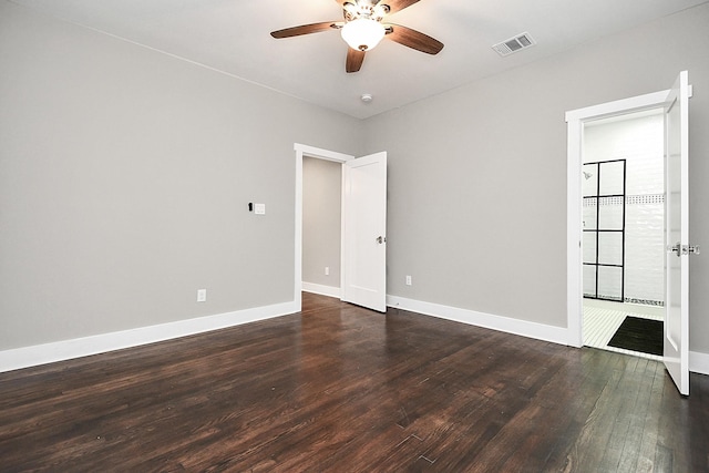 3013 Prospect St, Houston, TX 77004 - unfurnished room with baseboards, a ceiling fan, dark wood-type flooring, and visible vents
