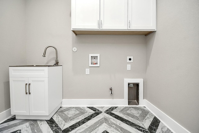 3013 Prospect St, Houston, TX 77004 - washroom with electric dryer hookup, cabinet space, hookup for a gas dryer, and washer hookup