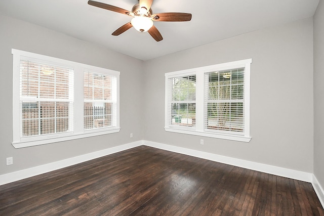 3013 Prospect St, Houston, TX 77004 - unfurnished room featuring ceiling fan, baseboards, dark wood-type flooring, and plenty of natural light