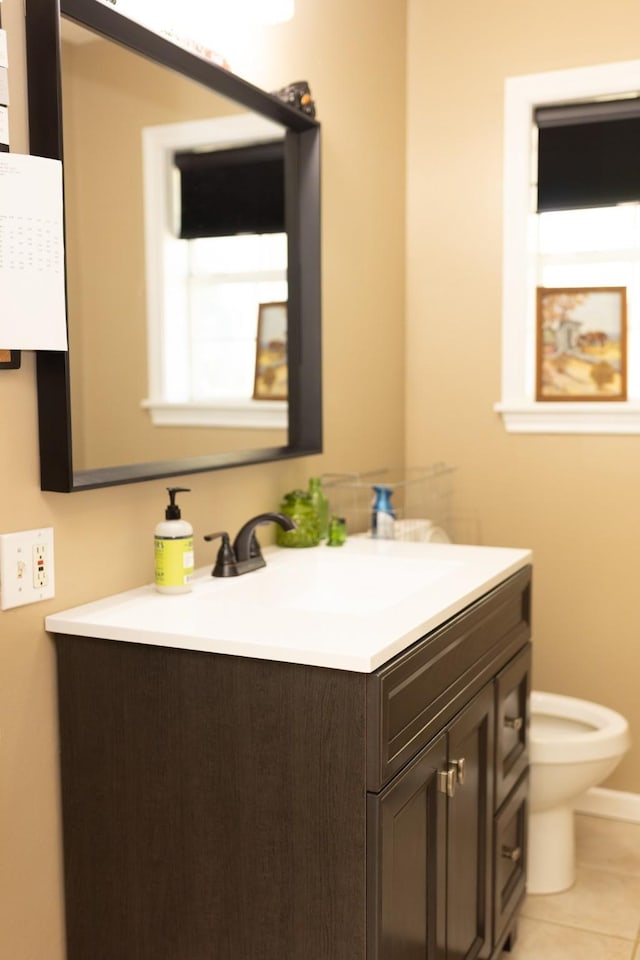 1867 Fm 2423, Grapeland, TX 75844 - bathroom with tile patterned flooring, baseboards, toilet, and vanity