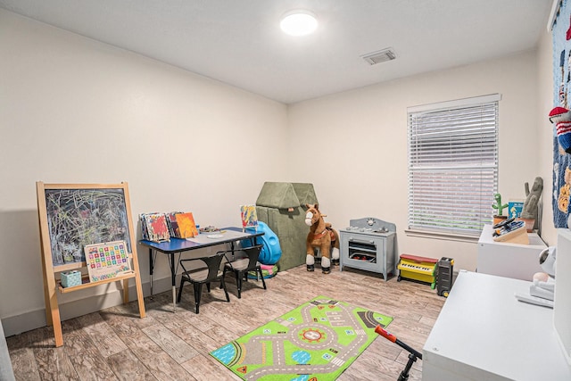 2884 Shallow Brook Ln, Dickinson, TX 77539 - recreation room featuring wood finished floors