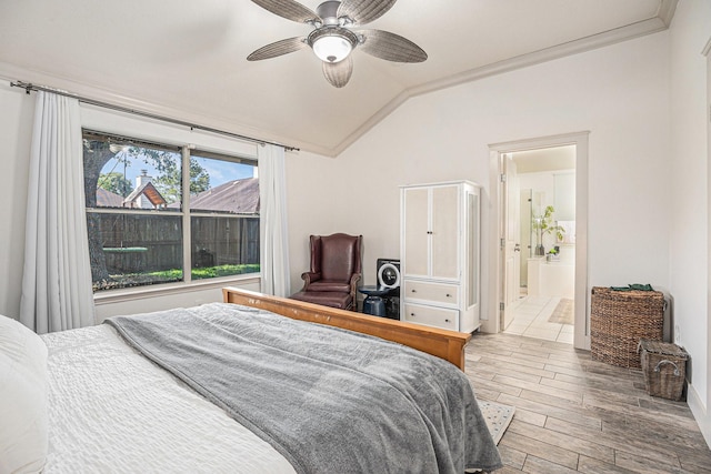 2884 Shallow Brook Ln, Dickinson, TX 77539 - bedroom with vaulted ceiling, wood finished floors, and a ceiling fan
