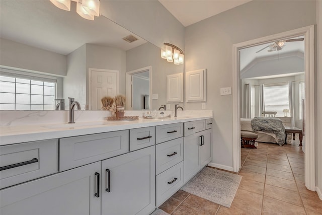 6919 S Gold River Cir, Missouri City, TX 77459 - bathroom with visible vents, a wealth of natural light, ceiling fan, and a sink