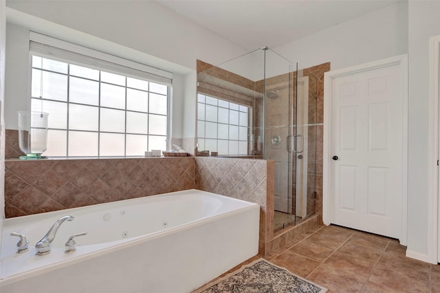 6919 S Gold River Cir, Missouri City, TX 77459 - full bath with a stall shower, a tub with jets, and a healthy amount of sunlight