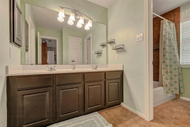 6919 S Gold River Cir, Missouri City, TX 77459 - bathroom with tile patterned floors, shower / bath combo, a sink, and double vanity