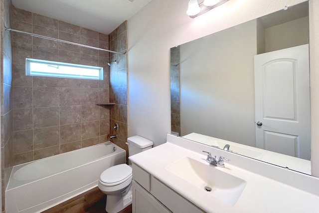 18871 Cedar Birch Ln, Magnolia, TX 77355 - bathroom with toilet, washtub / shower combination, wood finished floors, and vanity