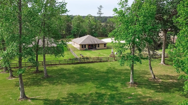 drone / aerial view featuring a view of trees