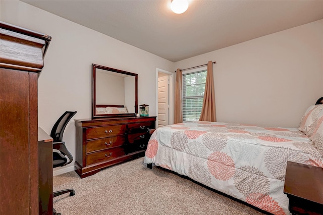 bedroom featuring carpet