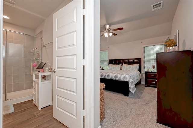 bedroom with visible vents, ceiling fan, and light wood-style flooring