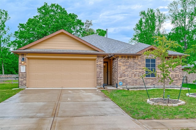 single story home with brick siding, concrete driveway, an attached garage, and a front lawn