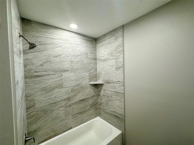 bathroom featuring recessed lighting and shower / bathing tub combination
