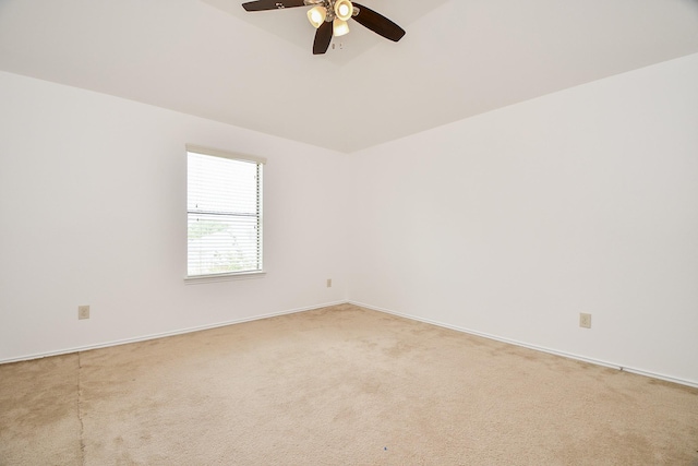 unfurnished room featuring baseboards, a ceiling fan, and carpet flooring