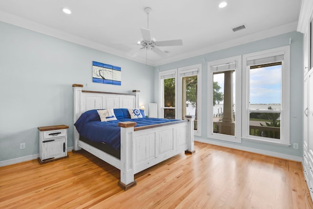 bedroom featuring recessed lighting, light wood-style floors, and baseboards