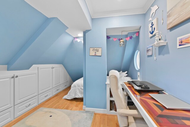 bedroom with light wood finished floors and ornamental molding