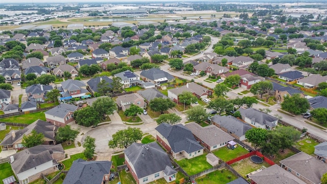 birds eye view of property with a residential view