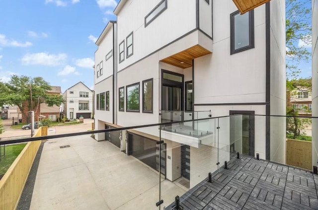 exterior space featuring stucco siding